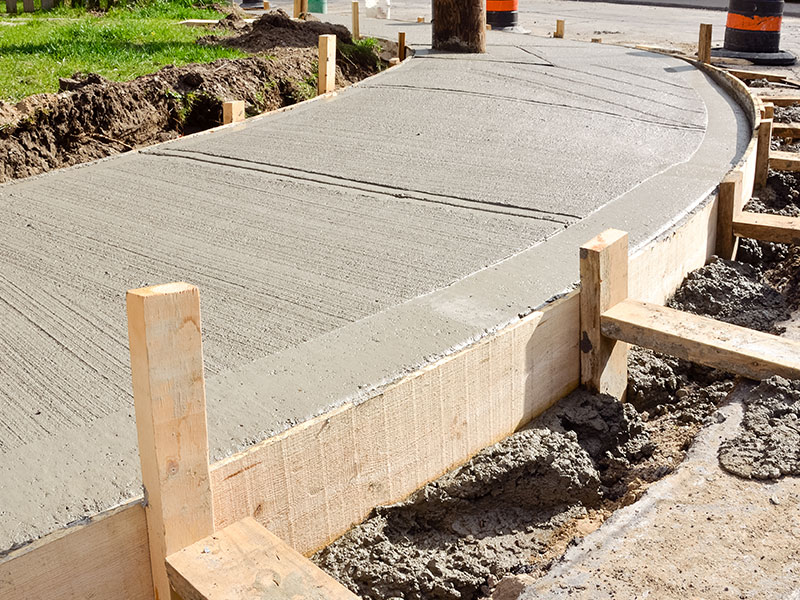 concrete sidewalk build in process at commercial property exteriors blue ridge mo